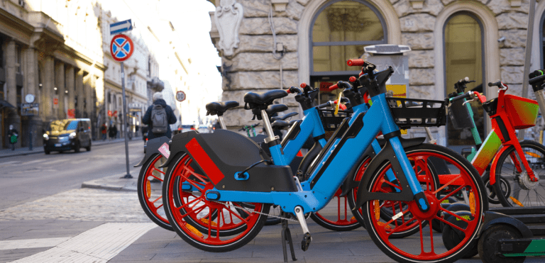 Electric bikes parked on the street