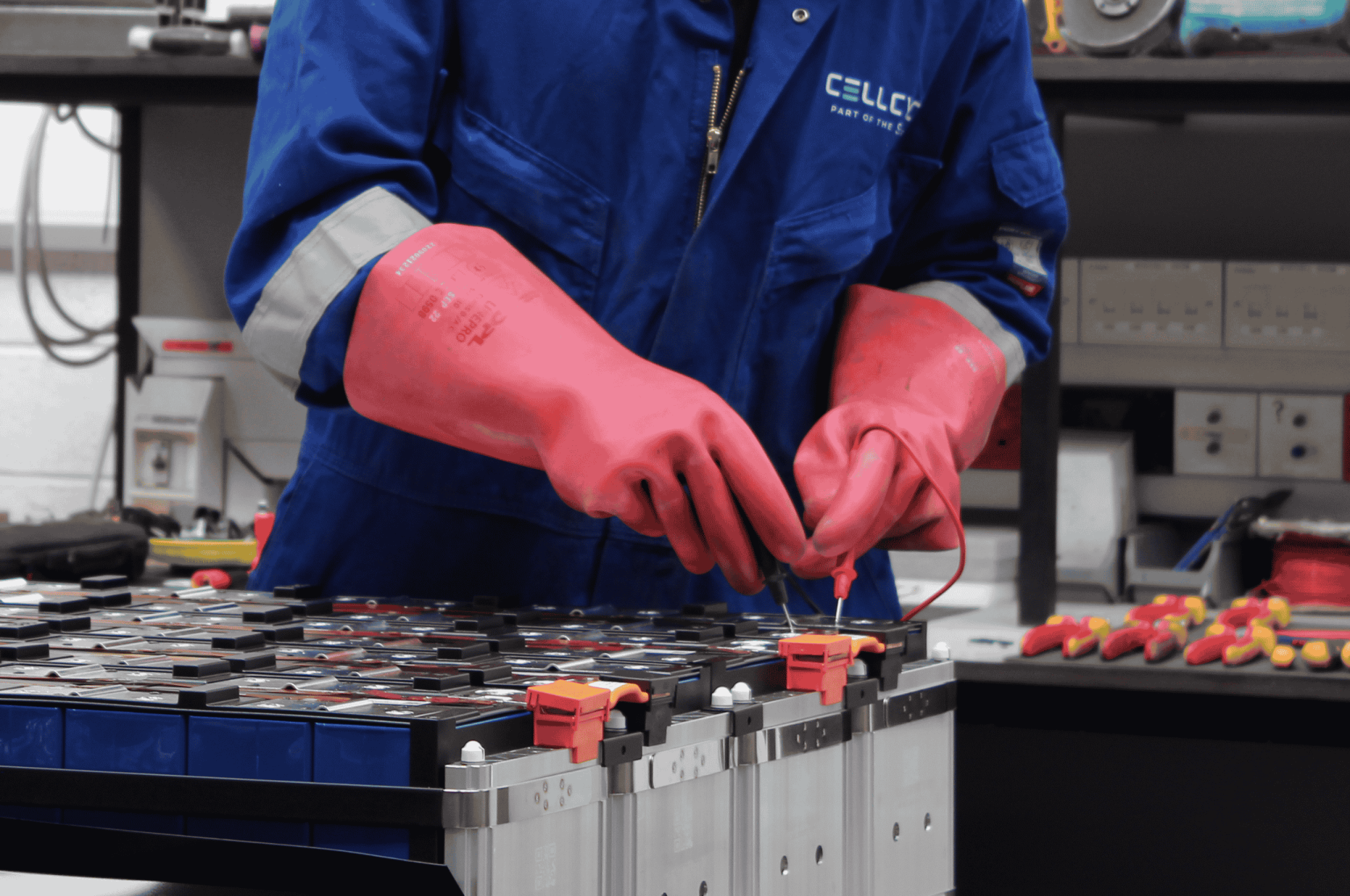 Cellcycle staff working on testing an lithium battery pack from energy storage system
